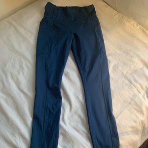 Fabletics running legging with pockets, teal blue